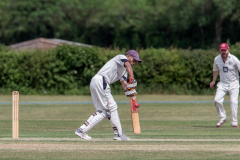 Kishan-Dave-watches-it-onto-the-bat
